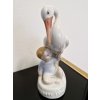 Porcelánový chlapeček s čápem