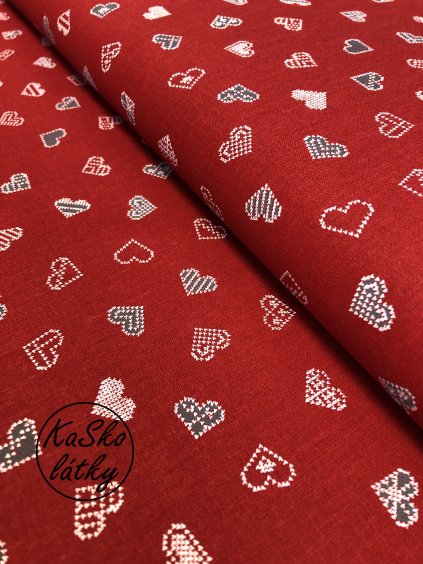Bavlněná látka barevná srdce na červené