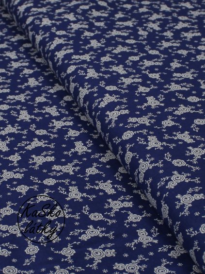 Bavlněná látka bílé květiny na modré