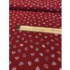 Bavlněná látka barevná srdce na červené
