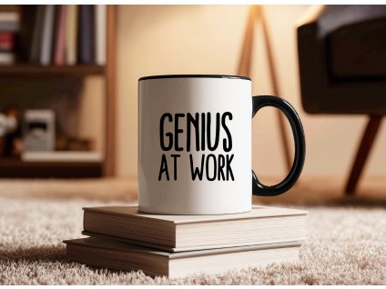 cerny hrnek s napisem genius at work