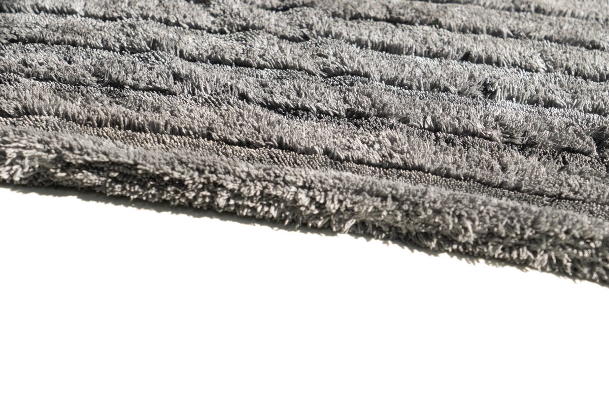 Detail vlákien sušiaceho uteráka z mikrovlákna.