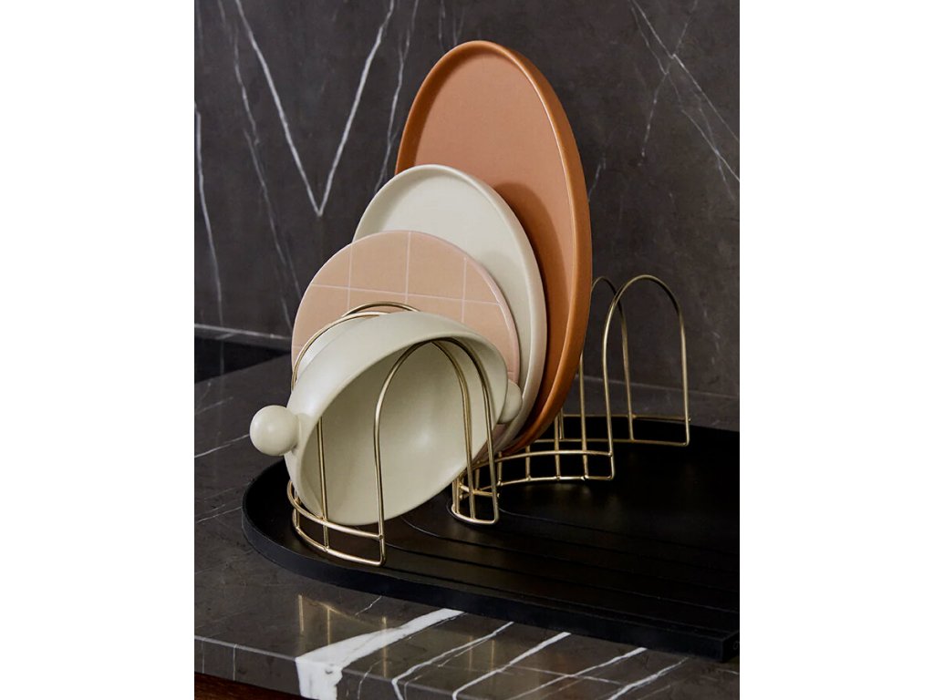 The brass stand can be used on the dish tray in silicone it helps keep track of plates etc. while they are drying.