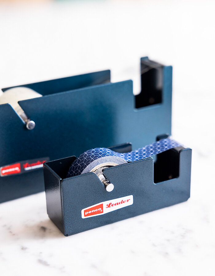 Small steel tape dispenser in navy