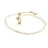 Split gold wider ring with pearl