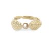 Gold engagement ring with pearl and leaves