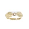 Gold engagement ring with pearl and leaves
