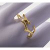 Women's gold-plated ring with a bird