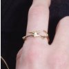 Women's gold-plated ring with a bird