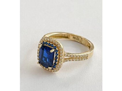 Dámský zlatý prsten zdobený modrým zirkonem