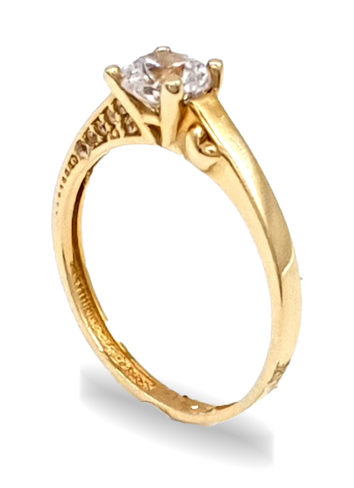 Zlatý zásnubní prsten se zirkonem