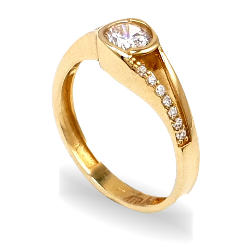 Zlatý zásnubní prsten zdobený masivním zirkonem