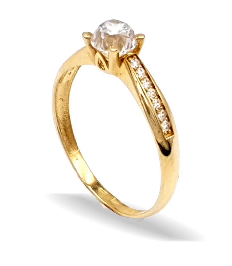 Zásnubní zlatý prsten zdobený zirkony
