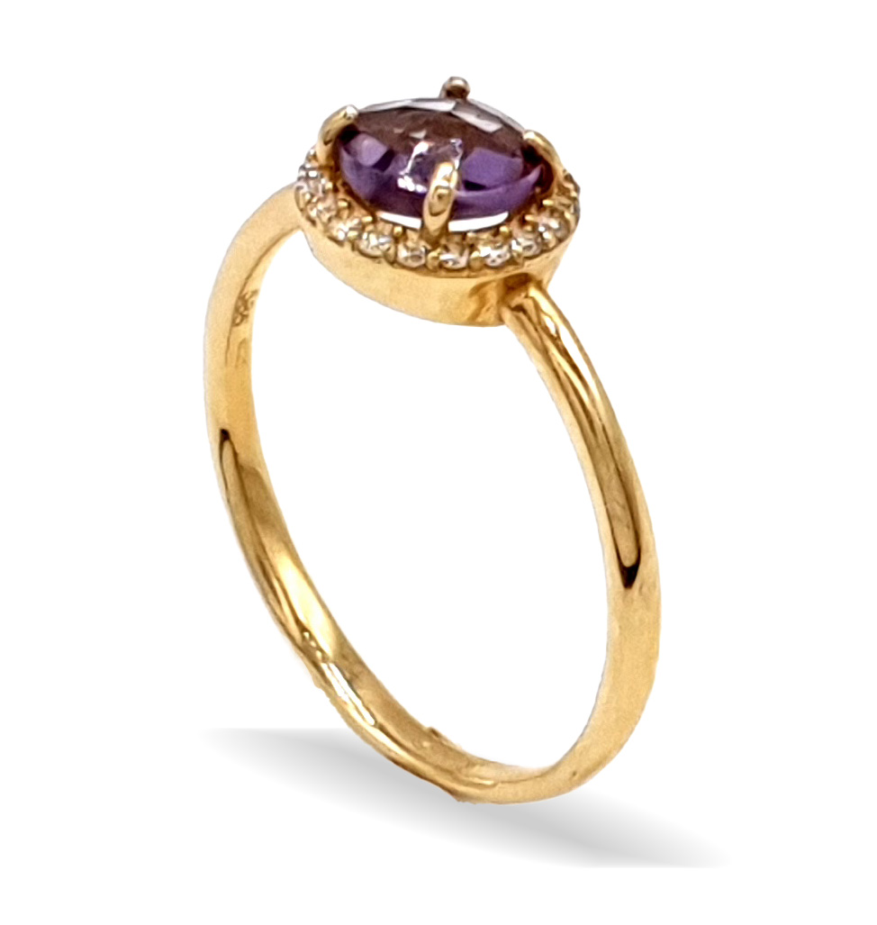 Zásnubní zlatý prsten s fialovým kamenem