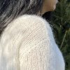 Detail pleteného svetříku z příze Touch me Mohair