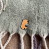 Pin kapybara s rostlinou