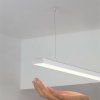 Záveska k povrchu a LED profilu napájacia KLUŚ FI-8-LIN-Z pre oceľové lanko (barva klus biela)
