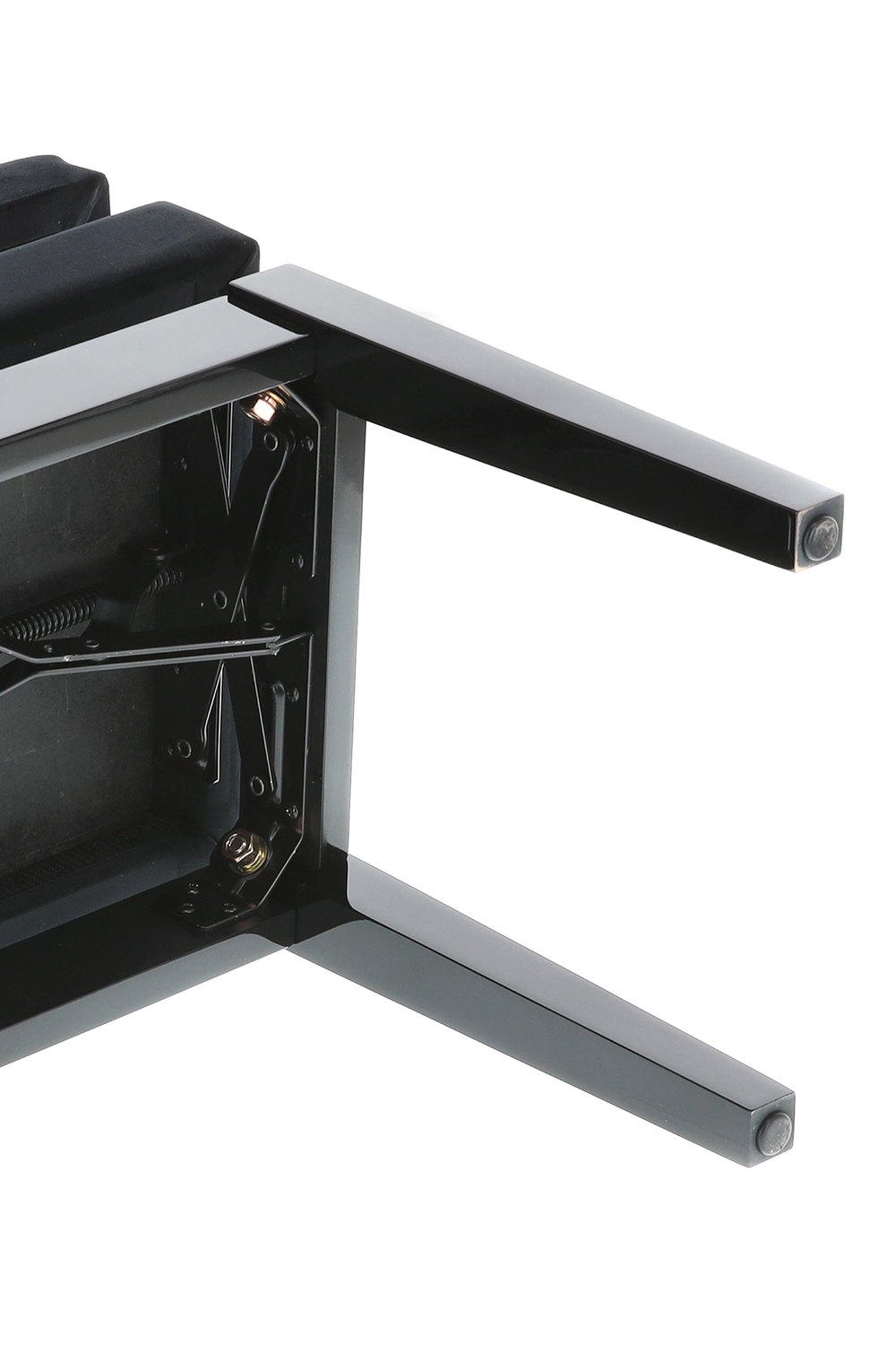 Nohy klavírní židle s gumovými podložkami.