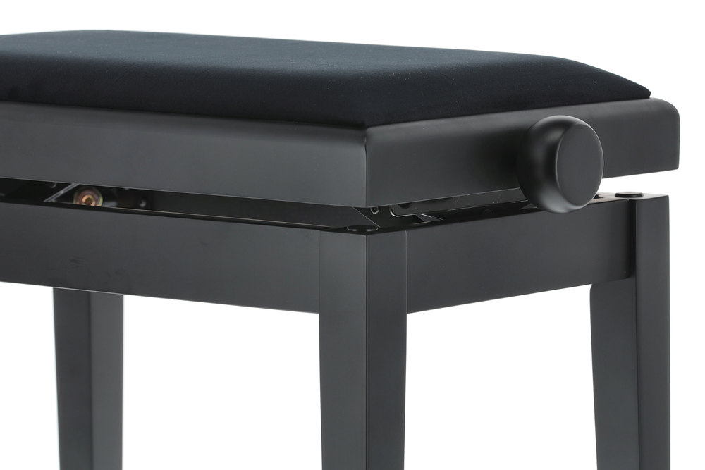 Otočné kolečko u klavírní stoličky.