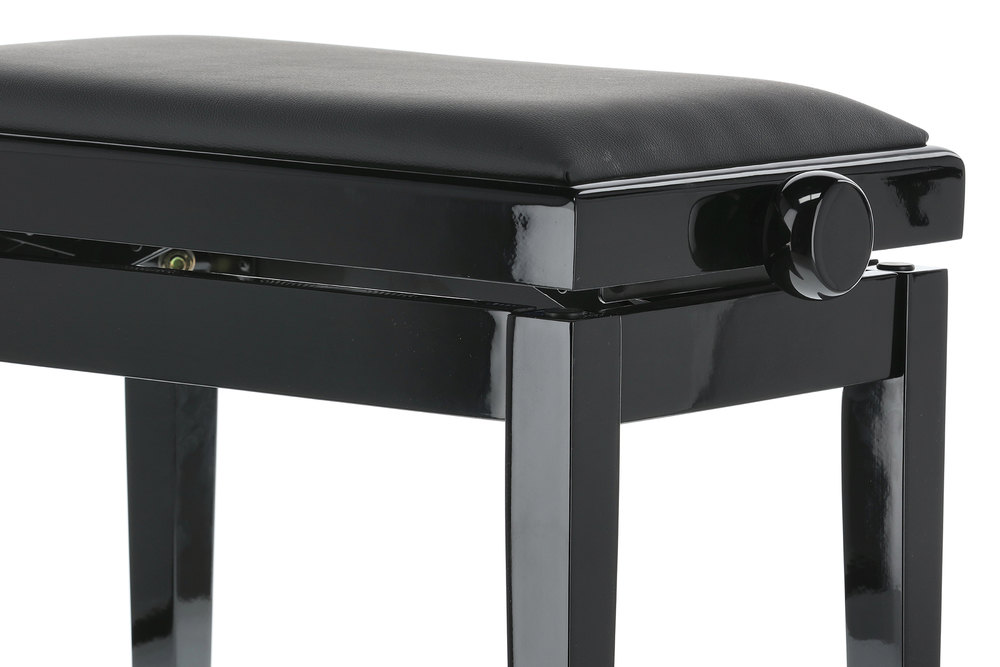 Klavírní stolička v černém vysokém lesku s koženkovým sedákem.