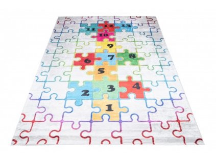 Dětský kusový koberec vhodný k praní BAMBINO 2673 Puzzle Číslice pogumovaný krémový barevný