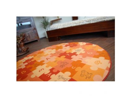 Dětský kulatý koberec PUZZLE oranžový
