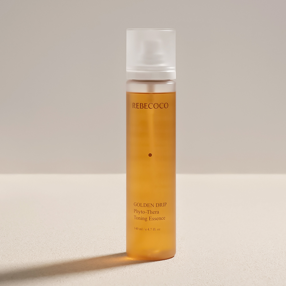 Levně Rozjasňující toner s Niaciamidem - Rebecoco Golden Drip Phyto-Thera Toning Essence
