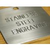 magnified image of engraving in stainless steel n144