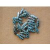 Korálky mačkané - jazýček modrý AB malá očka - 5 mm x 16 mm