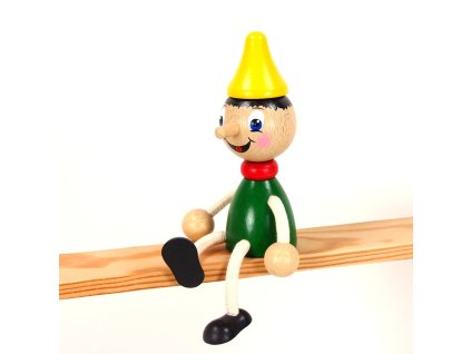 pinocchio wooden sitting figure