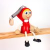 little red riding hood wooden figure on spring