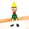 Sedací figurka hračka ze dřeva - Pinochio