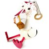 stork with baby wooden figure on spring