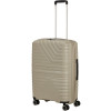 19900 10 american tourister flytwist 67cm spinner bezova sandstone rozsiritelny