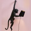 Wandlamp HANGING MONKEY 76,5 cm, linkshandig, zwart, Seletti