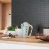 186467 2 smeg rucni mixer pastelova modra scena 02