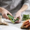 Vegetable peeler SAFESTORE 20167, green, Joseph Joseph