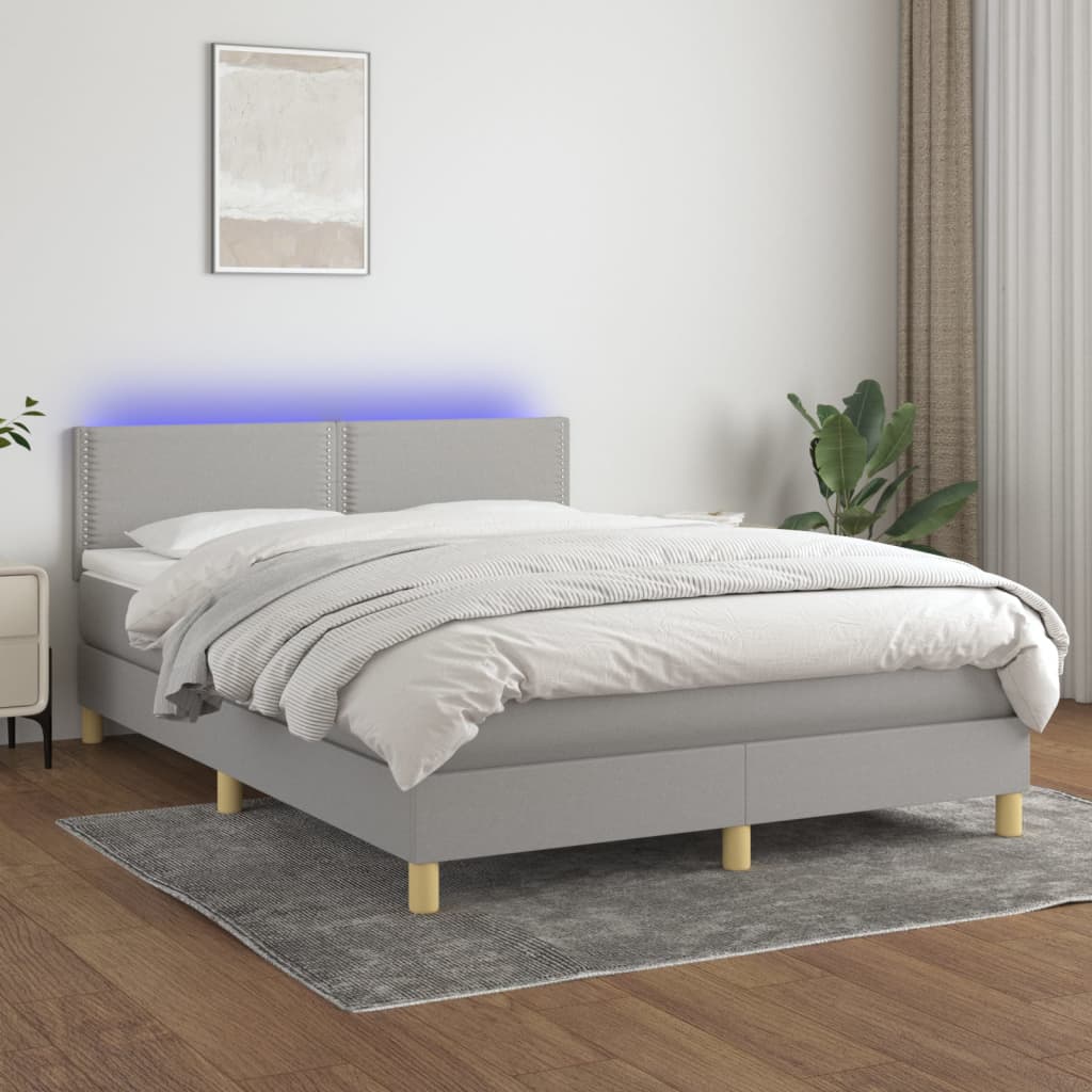 vidaXL Posteľ boxsping s matracom a LED bledosivá 140x200 cm látka