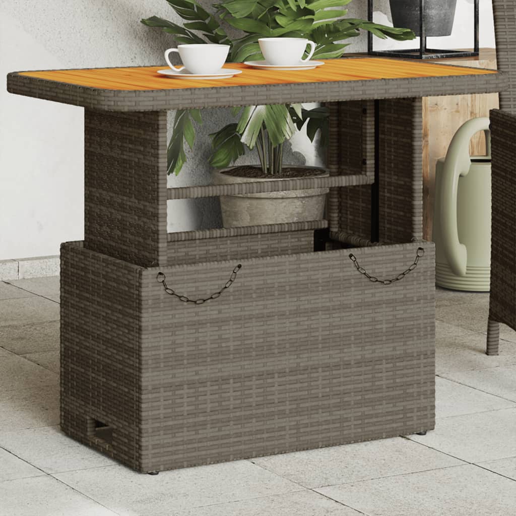 vidaXL Záhradný stôl sivý 90x55x71 cm polyratan a akáciový masív