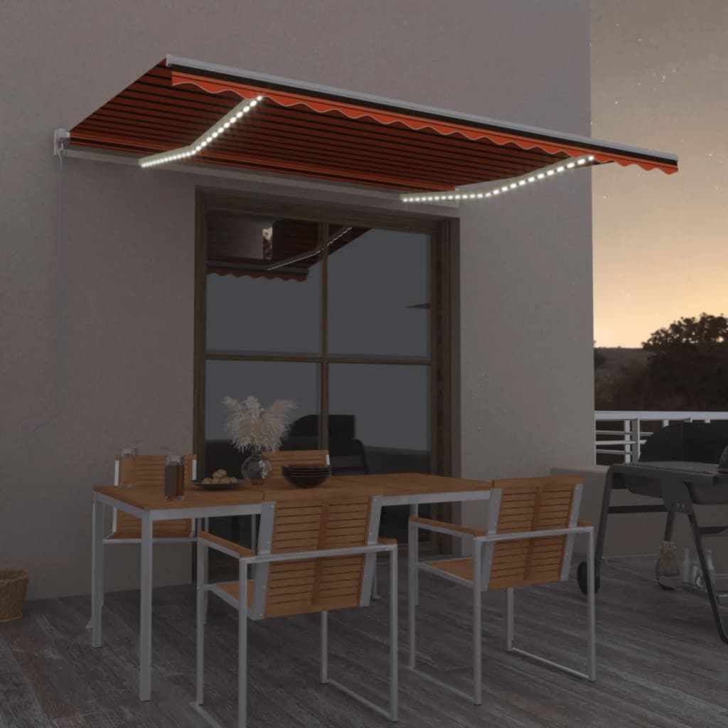 vidaXL Ručne zaťahovacia markíza s LED 450x300 cm oranžovo-hnedá