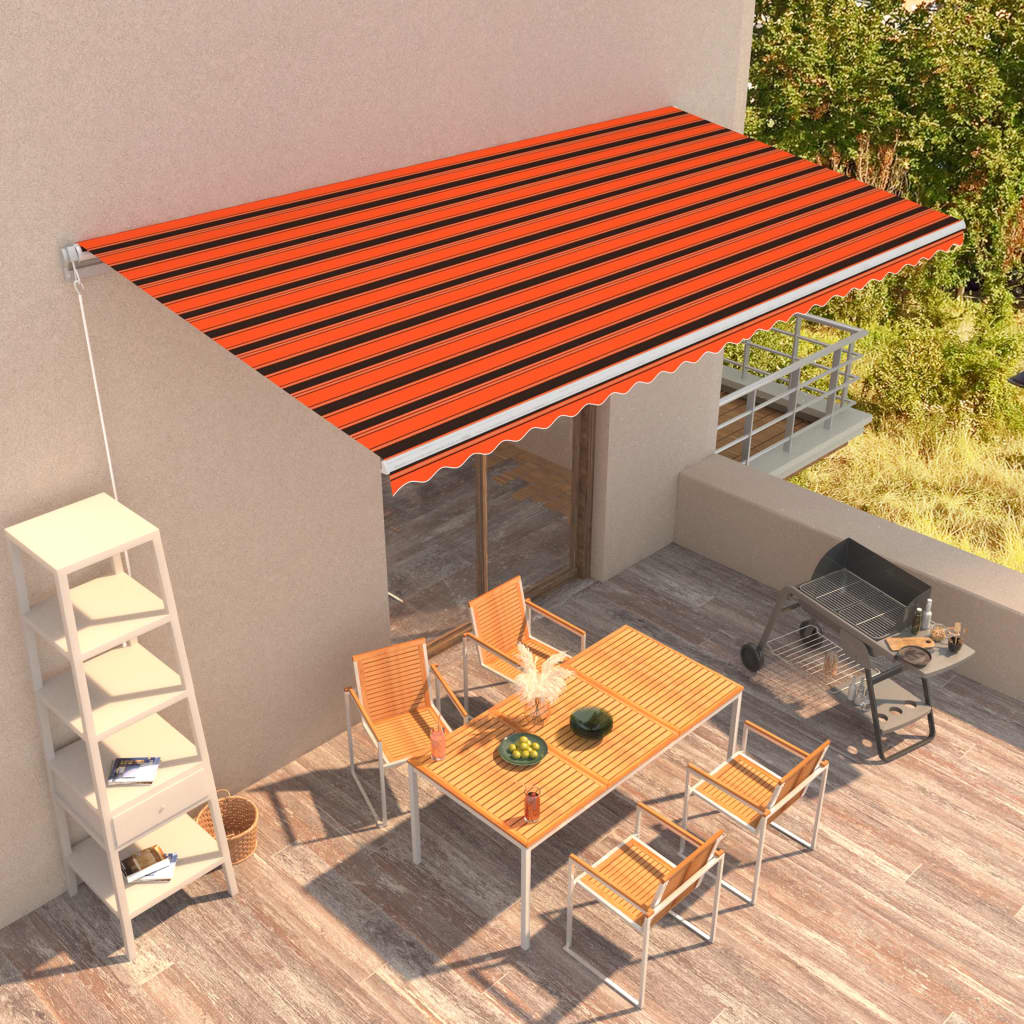 vidaXL Ručne zaťahovacia markíza oranžová a hnedá 600x300 cm