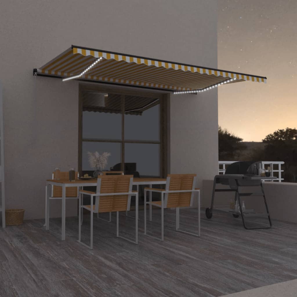 vidaXL Ručne zaťahovacia markíza s LED 500x350 cm žltá a biela