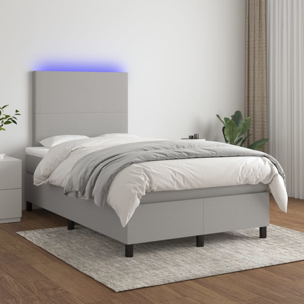 vidaXL Posteľ boxsping s matracom a LED bledosivá 120x200 cm látka