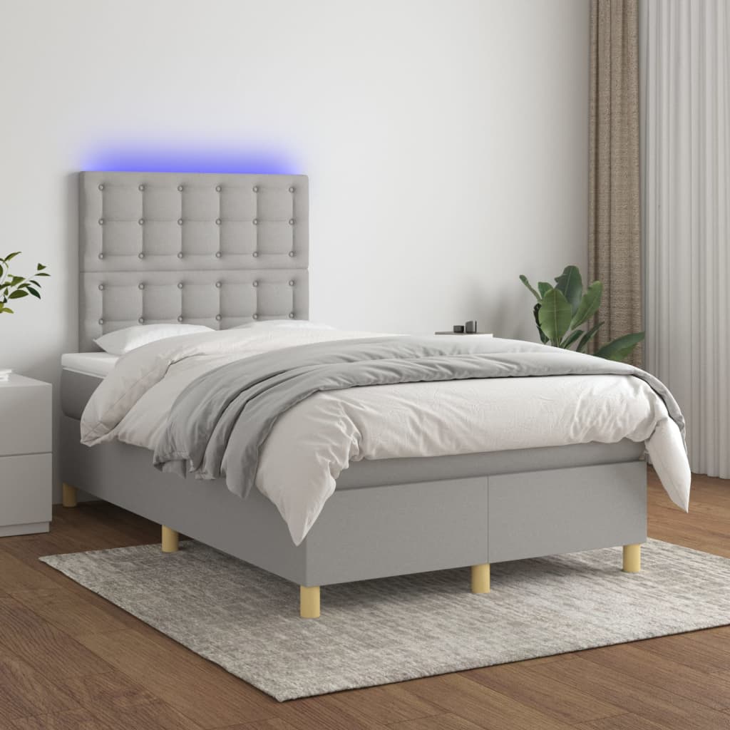 vidaXL Posteľ boxsping s matracom a LED bledosivá 120x200 cm látka