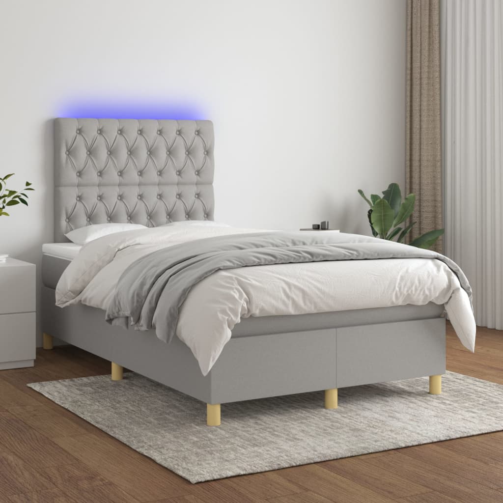 vidaXL Posteľ boxsping s matracom a LED bledosivá 120x200 cm látka