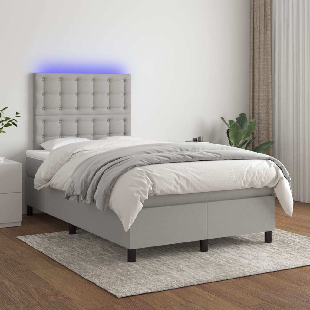 vidaXL Posteľ boxsping s matracom a LED bledosivá 120x200 cm látka