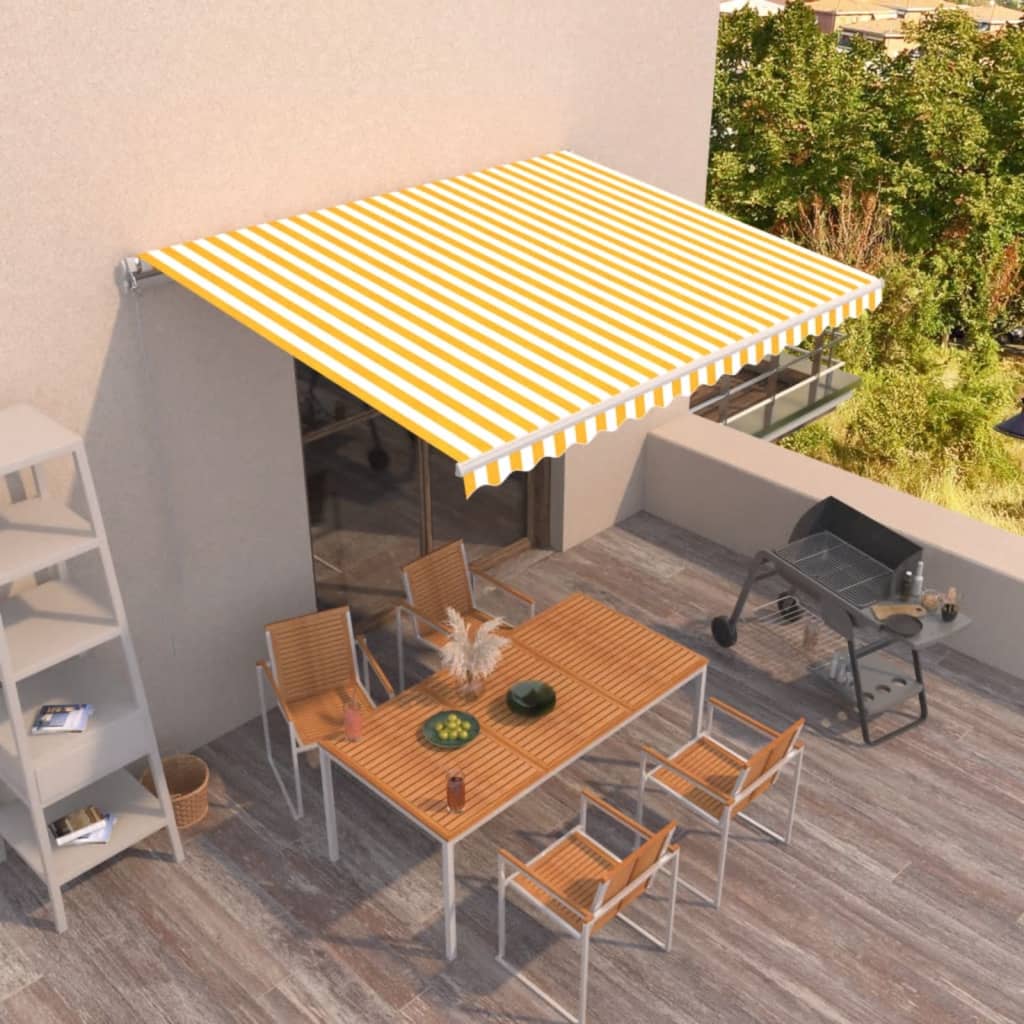vidaXL Ručne zaťahovacia markíza 450x350 cm žltá a biela