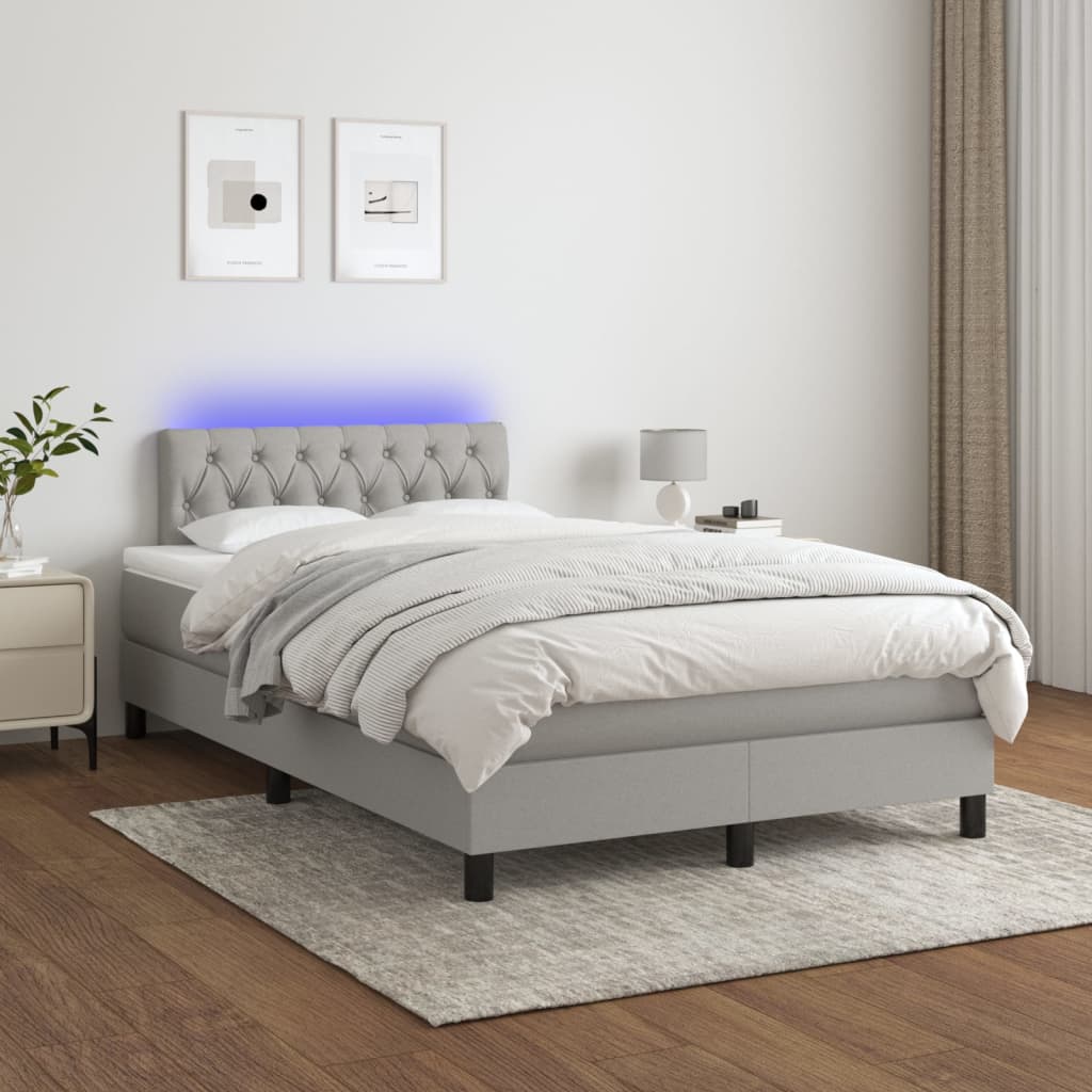 vidaXL Posteľ boxsping s matracom a LED bledosivá 120x200 cm látka