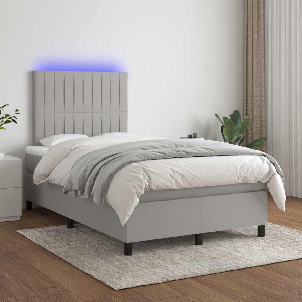 vidaXL Posteľ boxsping s matracom a LED bledosivá 120x200 cm látka
