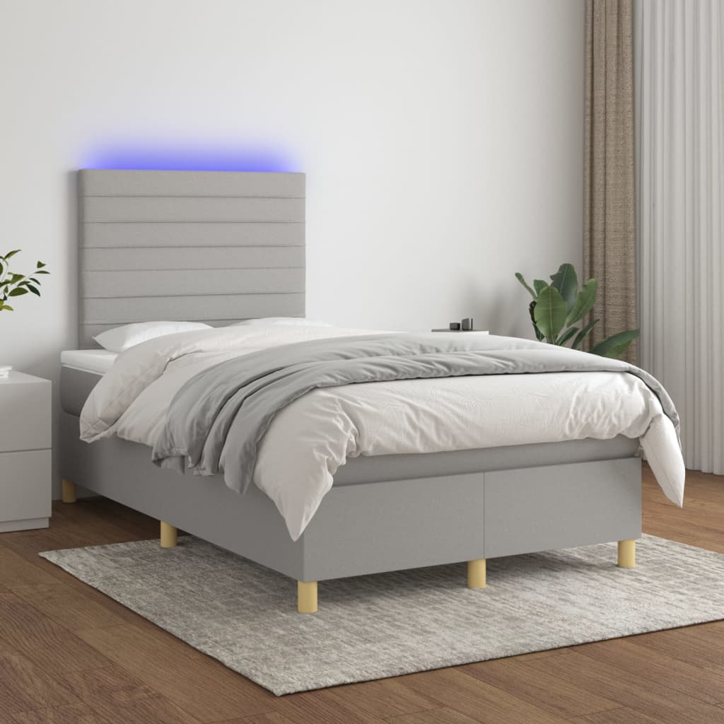 vidaXL Posteľ boxsping s matracom a LED bledosivá 120x200 cm látka